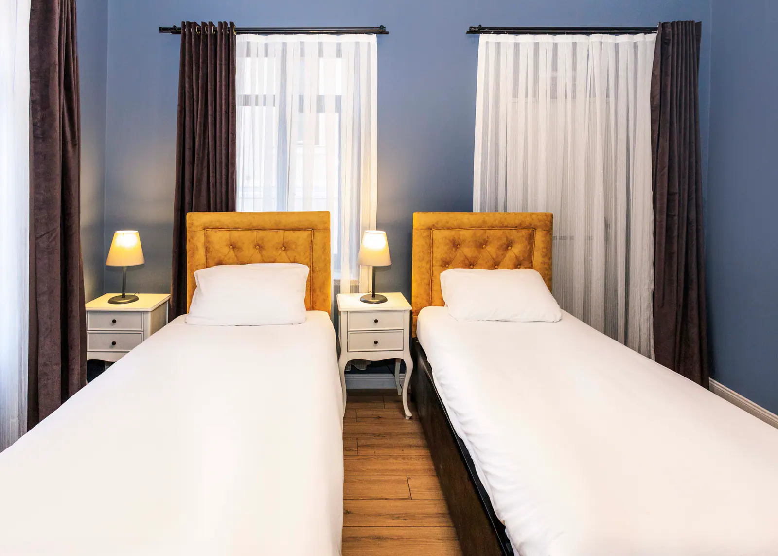Family Suite with Balcony — sleeping area