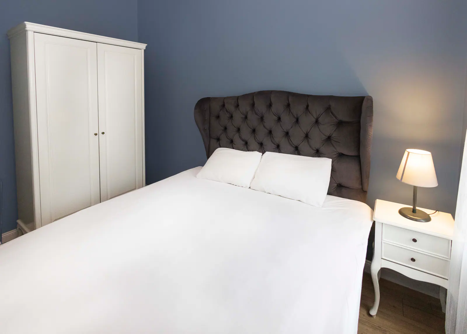 Family Suite with Balcony — sleeping area