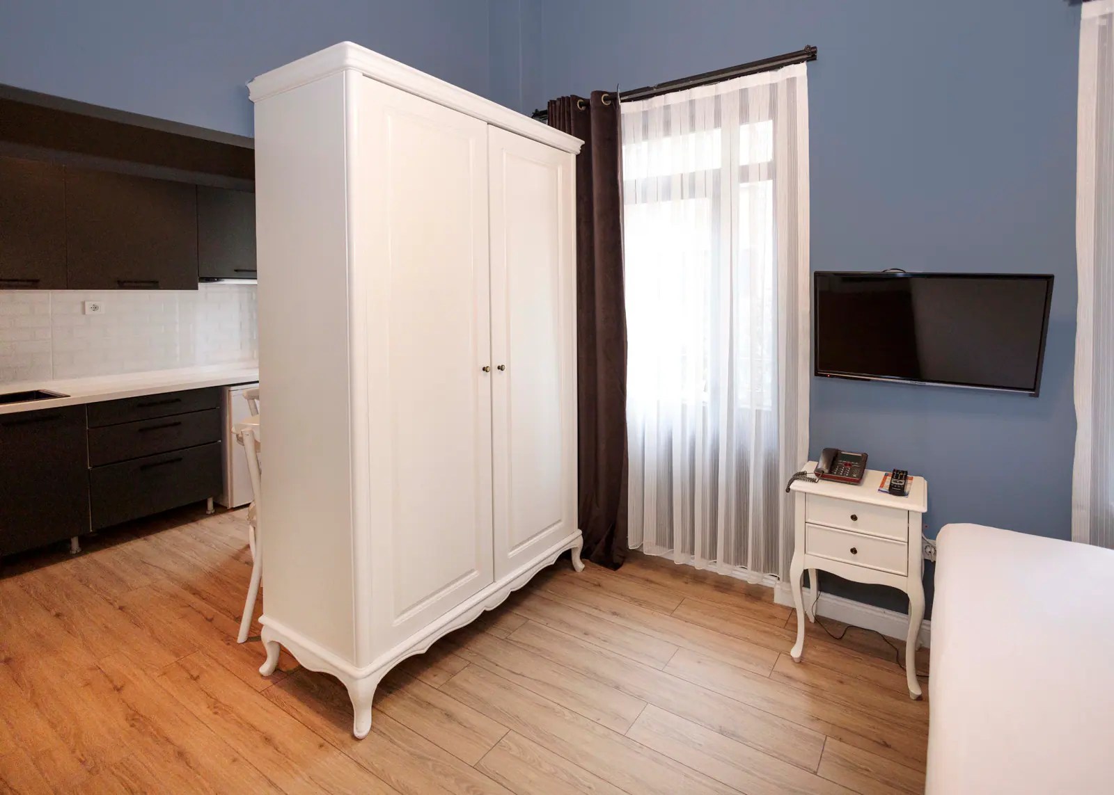 King Studio with Balcony — wardrobe and window