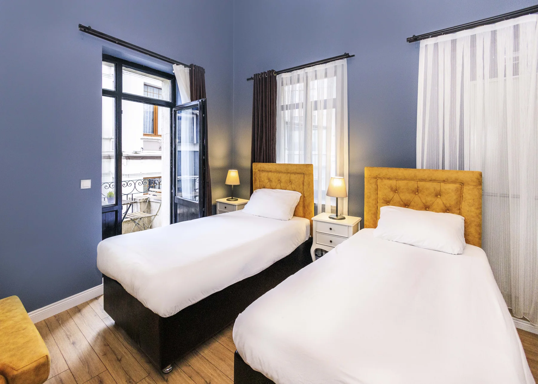 Family Suite twin bedroom with balcony doors